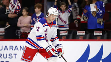 CHICAGO, ILLINOIS - FEBRUARY 19: Julien Gauthier #12 of the New York Rangers participates in warm-ups before a game against the Chicago Blackhawks at the United Center on February 19, 2020 in Chicago, Illinois. (Photo by Jonathan Daniel/Getty Images)