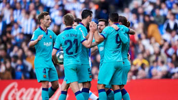 SAN SEBASTIAN, SPAIN - DECEMBER 14: Antoine Griezmann of FC Barcelona celebrates with teammates after scoring the equalizing goal during the Liga match between Real Sociedad and FC Barcelona at Estadio Anoeta on December 14, 2019 in San Sebastian, Spain. (Photo by Juan Manuel Serrano Arce/Getty Images)