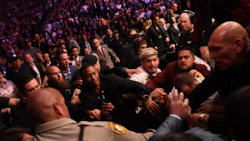 Las Vegas , United States - 6 October 2018; Khabib Nurmagomedov leaves the octagon in an altercation with members of Conor McGregor's team, including Dillon Danis following his UFC lightweight championship fight with Conor McGregor during UFC 229 at T-Mobile Arena in Las Vegas, Nevada, USA. (Photo By Stephen McCarthy/Sportsfile via Getty Images)
