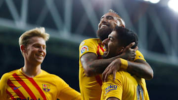 Barcelona's Arturo Vidal celebrates with Luis Suarez. (Photo by Eric Alonso/MB Media/Getty Images)