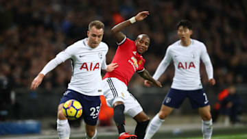 LONDON, ENGLAND - JANUARY 31: Christian Eriksen of Tottenham Hotspur is challenged by Ashley Young of Manchester United during the Premier League match between Tottenham Hotspur and Manchester United at Wembley Stadium on January 31, 2018 in London, England. (Photo by Julian Finney/Getty Images)