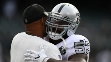 OAKLAND, CA - OCTOBER 19: Defensive Coordinator Ken Norton Jr. hugs NaVorro Bowman