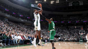 MILWAUKEE, WI - APRIL 30: Khris Middleton #22 of the Milwaukee Bucks shoots the ball against the Boston Celtics during Game Two of the Eastern Conference Semi Finals of the 2019 NBA Playoffs on April 30, 2019 at the Fiserv Forum Center in Milwaukee, Wisconsin. NOTE TO USER: User expressly acknowledges and agrees that, by downloading and or using this Photograph, user is consenting to the terms and conditions of the Getty Images License Agreement. Mandatory Copyright Notice: Copyright 2019 NBAE (Photo by Nathaniel S. Butler/NBAE via Getty Images).