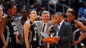 LOS ANGELES, CA - JUNE 2: The San Antonio Stars huddle around Dan Hughes and James Wade of the San Antonio Stars during the game against the Los Angeles Sparks at Staples Center on June 2, 2016 in Los Angeles, California. NOTE TO USER: User expressly acknowledges and agrees that, by downloading and or using this photograph, User is consenting to the terms and conditions of the Getty Images License Agreement. Mandatory Copyright Notice: Copyright 2016 NBAE (Photo by Juan Ocampo/NBAE via Getty Images)