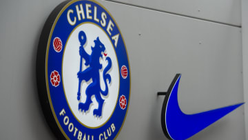 LONDON, ENGLAND - SEPTEMBER 28: Officlal Chelsea club crest next to official club kit supplier Nike 'swoosh' during to the Premier League match between Chelsea FC and Brighton & Hove Albion at Stamford Bridge on September 28, 2019 in London, United Kingdom. (Photo by Visionhaus)