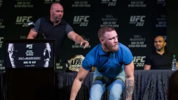 LAS VEGAS, NV - AUGUST 17: UFC featherweight champion Conor McGregor grabs two cans during the during the UFC 202 Press Conference at David Copperfield Theater in the MGM Grand Hotel/Casino on August 17, 2016 in Las Vegas, Nevada. (Photo by Brandon Magnus/Zuffa LLC/Zuffa LLC via Getty Images)