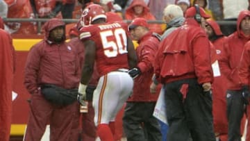 Nov 29, 2015; Kansas City, MO, USA; Kansas City Chiefs outside linebacker Justin Houston (50) is helped off the field against the Buffalo Bills in the first half at Arrowhead Stadium. Mandatory Credit: John Rieger-USA TODAY Sports