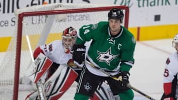 Nov 24, 2015; Dallas, TX, USA; Ottawa Senators goalie Craig Anderson (41) and Dallas Stars left wing Jamie Benn (14) in action during the game at the American Airlines Center. The Senators defeat the Stars 7-4. Mandatory Credit: Jerome Miron-USA TODAY Sports