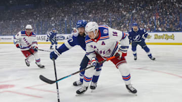 TAMPA, FLORIDA - JUNE 05: Victor Hedman #77 of the Tampa Bay Lightning battles for the puck against Ryan Strome #16 of the New York Rangers during the first period in Game Three of the Eastern Conference Final of the 2022 Stanley Cup Playoffs at Amalie Arena on June 05, 2022 in Tampa, Florida. (Photo by Bruce Bennett/Getty Images)