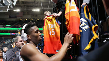SALT LAKE CITY, UT - DECEMBER 27: Donovan Mitchell #45 of the Utah Jazz signs autographs for fans prior to the game against the Philadelphia 76ers on December 27, 2018 at vivint.SmartHome Arena in Salt Lake City, Utah. Copyright 2018 NBAE (Photo by Melissa Majchrzak/NBAE via Getty Images)
