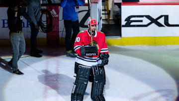 CHICAGO, IL - MARCH 29: Chicago Blackhawks goalie Scott Foster (90), serving as emergency goalie after signing a one day amateur tryout (ATO) contract, skates after being named number one star of the game after an NHL hockey game between the Winnipeg Jets and the Chicago Blackhawks on March 29, 2018, at the United Center in Chicago, IL. The Blackhawks won 6-2. (Photo by Daniel Bartel/Icon Sportswire via Getty Images)