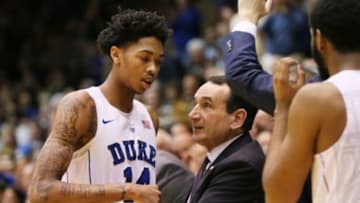 Dec 15, 2015; Durham, NC, USA; Duke Blue Devils head coach Mike Krzyzewski (C) talks to guard Brandon Ingram (14) after leaving the game against the Georgia Southern Eagles at Cameron Indoor Stadium. Mandatory Credit: Mark Dolejs-USA TODAY Sports