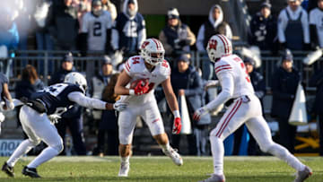 Nov 10, 2018; University Park, PA, USA; Wisconsin Badgers tight end Jake Ferguson (84) runs the ball during the fourth quarter against the Penn State Nittany Lions at Beaver Stadium. Penn State defeated Wisconsin 22-10. Mandatory Credit: Matthew O'Haren-USA TODAY Sports