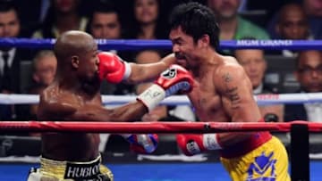 May 2, 2015; Las Vegas, NV, USA; Floyd Mayweather and Manny Pacquiao box during their world welterweight championship bout at MGM Grand Garden Arena. Mandatory Credit: Joe Camporeale-USA TODAY Sports