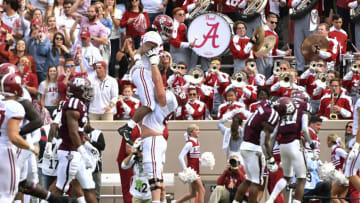 COLLEGE STATION, TEXAS - OCTOBER 12: Running back Keilan Robinson #2 and offensive lineman Landon Dickerson #69 of the Alabama Crimson Tide celebrate scoring a touchdown during the game against Texas A&M Aggies at Kyle Field on October 12, 2019 in College Station, Texas. (Photo by Logan Riely/Getty Images)