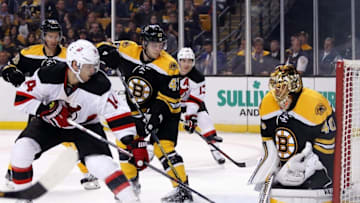 Oct 20, 2016; Boston, MA, USA; Boston Bruins goalie Tuukka Rask (40) makes a save as New Jersey Devils center Adam Henrique (14) and Boston Bruins defenseman Torey Krug (47) look for the rebound during the third period of the Boston Bruins 2-1 win over the New Jersey Devils at TD Garden. Mandatory Credit: Winslow Townson-USA TODAY Sports