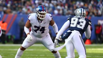 EAST RUTHERFORD, NJ - DECEMBER 10: Ereck Flowers #74 of the New York Giants in action against Benson Mayowa #93 of the Dallas Cowboys during their game at MetLife Stadium on December 10, 2017 in East Rutherford, New Jersey. (Photo by Al Bello/Getty Images)