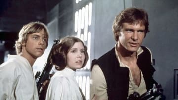 Harrison Ford, Carrie Fisher, and Mark Hamill in Star Wars (1977). Photo by Sunset Boulevard - ©