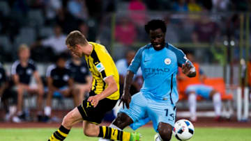 SHENZHEN - JULY 28: Manchester City striker Wilfried Bony (r) fights for the ball with Borussia Dortmund midfielder Sven Bender (l) during the match between Borussia Dortmund vs Manchester City FC at the 2016 International Champions Cup China match at the Shenzhen Stadium on 28 July 2016 in Shenzhen, China. (Photo by Power Sport Images/Getty Images)