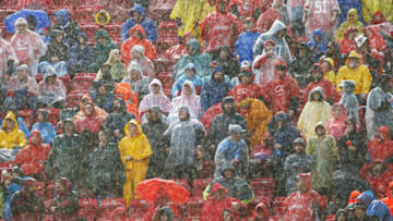 KANSAS CITY, MO - DECEMBER 13: Kansas City Chiefs fans watch the game in the rain at Arrowhead Stadium during the first quarter of the game against the San Diego Chargers on December 13, 2015 in Kansas City, Missouri. (Photo by Jamie Squire/Getty Images)