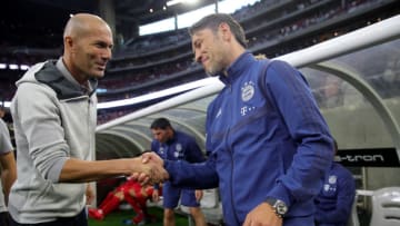 HOUSTON, TEXAS - JULY 20: Niko Kovac, head coach of Bayern Muenchen shake hands with Zinedine Zidane, head coach of Real prior to the International Champions Cup match between Bayern Muenchen and Real Madrid in the 2019 International Champions Cup at NRG Stadium on July 20, 2019 in Houston, Texas. (Photo by Alexander Hassenstein/Bongarts/Getty Images)