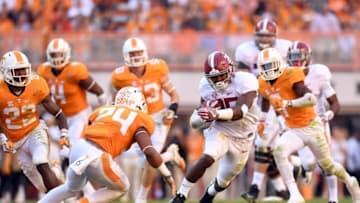 Oct 15, 2016; Knoxville, TN, USA; Alabama Crimson Tide running back Joshua Jacobs (25) carries up the field against Tennessee Volunteers defensive back Todd Kelly Jr. (24) during the second quarter at Neyland Stadium. Mandatory Credit: John David Mercer-USA TODAY Sports
