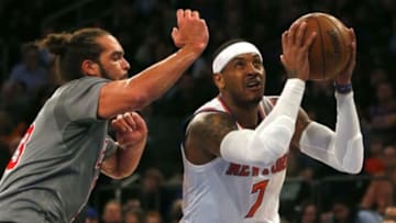 Dec 19, 2015; New York, NY, USA; New York Knicks forward Carmelo Anthony (7) drives to the basket against Chicago Bulls center Joakim Noah (13) during the first half at Madison Square Garden. Mandatory Credit: Noah K. Murray-USA TODAY Sports