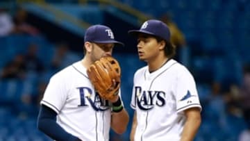 Aug 26, 2015; St. Petersburg, FL, USA; Tampa Bay Rays starting pitcher Chris Archer (22) and third baseman Evan Longoria (3) talk on the mound against the Minnesota Twins at Tropicana Field. Mandatory Credit: Kim Klement-USA TODAY Sports
