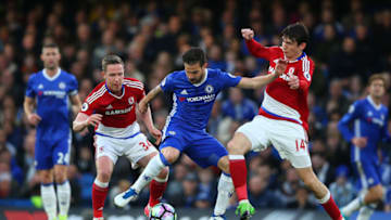LONDON, ENGLAND - MAY 08: Cesc Fabregas of Chelsea is tackled by Adam Forshaw and Marten de Roon of Middlesbrough during the Premier League match between Chelsea and Middlesbrough at Stamford Bridge on May 8, 2017 in London, England. (Photo by Catherine Ivill - AMA/Getty Images)