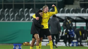 Jadon Sancho and Erling Haaland celebrate Borussia Dortmund's win over Gladbach (Photo by Lars Baron/Getty Images)