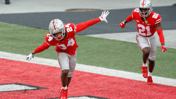 Nov 21, 2020; Columbus, Ohio, USA; Ohio State Buckeyes cornerback Shaun Wade (24)celebrates his interception return for a touchdown during the third quarter against the Indiana Hoosiers at Ohio Stadium. Mandatory Credit: Joseph Maiorana-USA TODAY Sports