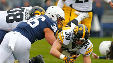 STATE COLLEGE, PA - OCTOBER 27: Nate Wieting #39 of the Iowa Hawkeyes recovers a fumble against Jan Johnson #36 of the Penn State Nittany Lions on October 27, 2018 at Beaver Stadium in State College, Pennsylvania. (Photo by Justin K. Aller/Getty Images)