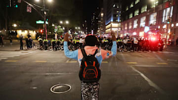 NEW YORK, NEW YORK - MAY 31: Police confront protesters in Manhattan on May 31, 2020 in New York City. Minneapolis Police officer Derek Chauvin was filmed kneeling on George Floyd's neck who was later pronounced dead at a local hospital. Floyd's death, the most recent in a series of deaths of black Americans while in police custody, has set off days and nights of protests across the country. (Photo by Spencer Platt/Getty Images)