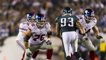 Sep 30, 2012; Philadelphia, PA, USA; New York Giants guard Chris Snee (76) looks to block during the second quarter against the Philadelphia Eagles at Lincoln Financial Field.The Eagles defeated The Giants 19-17. Mandatory Credit: Howard Smith-USA TODAY Sports