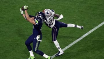 Feb 1, 2015; Glendale, AZ, USA; New England Patriots strong safety Malcolm Butler (21) breaks up a pass intended for Seattle Seahawks wide receiver Jermaine Kearse (15) during the third quarter in Super Bowl XLIX at University of Phoenix Stadium. Mandatory Credit: Richard Mackson-USA TODAY Sports