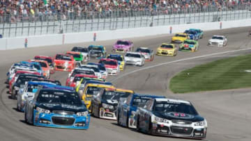 Mar 8, 2015; Las Vegas, NV, USA; Sprint Cup Series driver Kevin Harvick (4) leads the field on a restart during the Kobalt 400 at Las Vegas Motor Speedway. Mandatory Credit: Jerome Miron-USA TODAY Sports