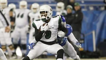 Nov 21, 2015; Lexington, KY, USA; Charlotte 49ers running back Ardy Holmes (8) runs the ball against the Kentucky Wildcats in the second hafl at Commonwealth Stadium. Mandatory Credit: Mark Zerof-USA TODAY Sports