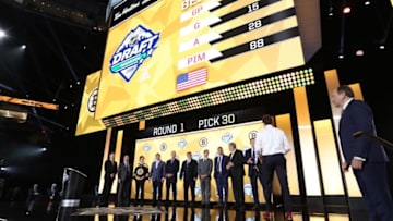 VANCOUVER, BRITISH COLUMBIA - JUNE 21: John Beecher, 30th overall pick of the Boston Bruins, walks onstage during the first round of the 2019 NHL Draft at Rogers Arena on June 21, 2019 in Vancouver, Canada. (Photo by Dave Sandford/NHLI via Getty Images)