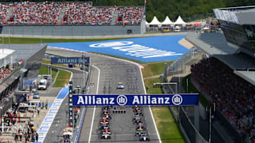 SPIELBERG, AUSTRIA - JUNE 22: The drivers approach the first corner start the Austrian Formula One Grand Prix at Red Bull Ring on June 22, 2014 in Spielberg, Austria. (Photo by Mark Thompson/Getty Images)