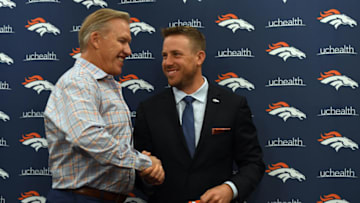 ENGLEWOOD, CO MARCH 16: Denver Broncos quarterback Case Keenum shakes hands with John Elway, general manager and executive vice president of football operations of the Denver Broncos after posing with his jersey during a press conference on March 16, 2018 at Dove Valley. Case Keenum agreed to terms on a two-year deal with the Denver Broncos. (Photo by John Leyba/The Denver Post via Getty Images)