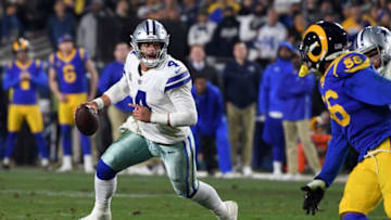 LOS ANGELES, CA - JANUARY 12: Dak Prescott #4 of the Dallas Cowboys looks to pass in the fourth quarter against the Los Angeles Rams in the NFC Divisional Playoff game at Los Angeles Memorial Coliseum on January 12, 2019 in Los Angeles, California. (Photo by Harry How/Getty Images)