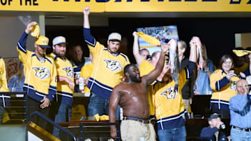 NASHVILLE, TN - MAY 22: Tennessee Titans players cheer on the Nashville Predators in Game Six of the Western Conference Final against the Anaheim Ducks during the 2017 Stanley Cup Playoffs at Bridgestone Arena on May 22, 2017 in Nashville, Tennessee. (Photo by Sanford Myers/Getty Images)