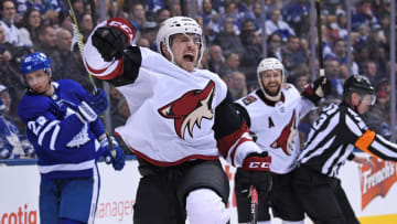 TORONTO, ON - JANUARY 20: Arizona Coyotes Right Wing Vinnie Hinostroza (13) celebrates a goal during the regular season NHL game between the Arizona Coyotes and Toronto Maple Leafs on January 20, 2019 at Scotiabank Arena in Toronto, ON. (Photo by Gerry Angus/Icon Sportswire via Getty Images)