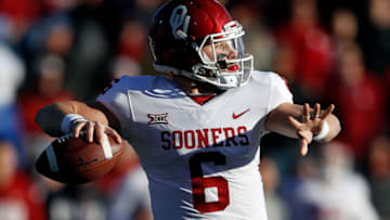 LAWRENCE, KS - NOVEMBER 18: Quarterback Baker Mayfield #6 of the Oklahoma Sooners passes during the game against the Kansas Jayhawks at Memorial Stadium on November 18, 2017 in Lawrence, Kansas. (Photo by Jamie Squire/Getty Images)