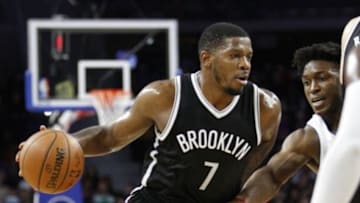 Jan 9, 2016; Auburn Hills, MI, USA; Brooklyn Nets forward Joe Johnson (7) dribbles the ball around Detroit Pistons forward Stanley Johnson (3) during the second quarter at The Palace of Auburn Hills. Mandatory Credit: Raj Mehta-USA TODAY Sports