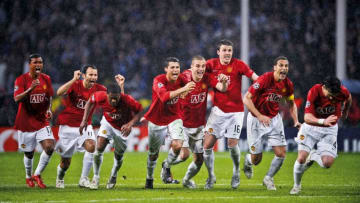 Manchester United players celebrate the moment they win the penalty shoot-out against Chelsea in the Champions League Final at the Luzhniki Stadium on May 21st 2008 in Moscow, Russia (Photo by Tom Jenkins/Getty Images). An image from the book "In The Moment" published June 2012