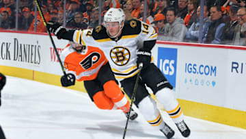 PHILADELPHIA, PA - MARCH 10: Chris Wagner #14 of the Boston Bruins skates away from Nate Thompson #44 of the Philadelphia Flyers in the first period at Wells Fargo Center on March 10, 2020 in Philadelphia, Pennsylvania. (Photo by Drew Hallowell/Getty Images)