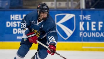 PLYMOUTH, MI - FEBRUARY 14: Jesperi Kotkaniemi #28 of the Finland Nationals skates up ice with the puck against the Russian Nationals during the 2018 Under-18 Five Nations Tournament game at USA Hockey Arena on February 14, 2018 in Plymouth, Michigan. Russia defeated Finland 4-0. (Photo by Dave Reginek/Getty Images)*** Local Caption *** Jesperi Kotkaniemi