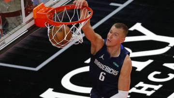 ATLANTA, GA - FEBRUARY 03: Kristaps Porzingis #6 of the Dallas Mavericks dunks during the second half against the Atlanta Hawks at State Farm Arena on February 3, 2021 in Atlanta, Georgia. NOTE TO USER: User expressly acknowledges and agrees that, by downloading and/or using this photograph, user is consenting to the terms and conditions of the Getty Images License Agreement. (Photo by Todd Kirkland/Getty Images)