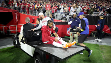 GLENDALE, ARIZONA - DECEMBER 12: Kyler Murray #1 of the Arizona Cardinals is carted off the field after being injured against the New England Patriots during the first quarter of the game at State Farm Stadium on December 12, 2022 in Glendale, Arizona. (Photo by Christian Petersen/Getty Images)